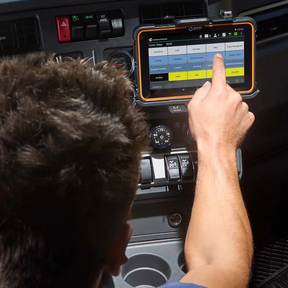 Truck driver interacting with predictive workflow screen on ISAAC’s in-cab tablet